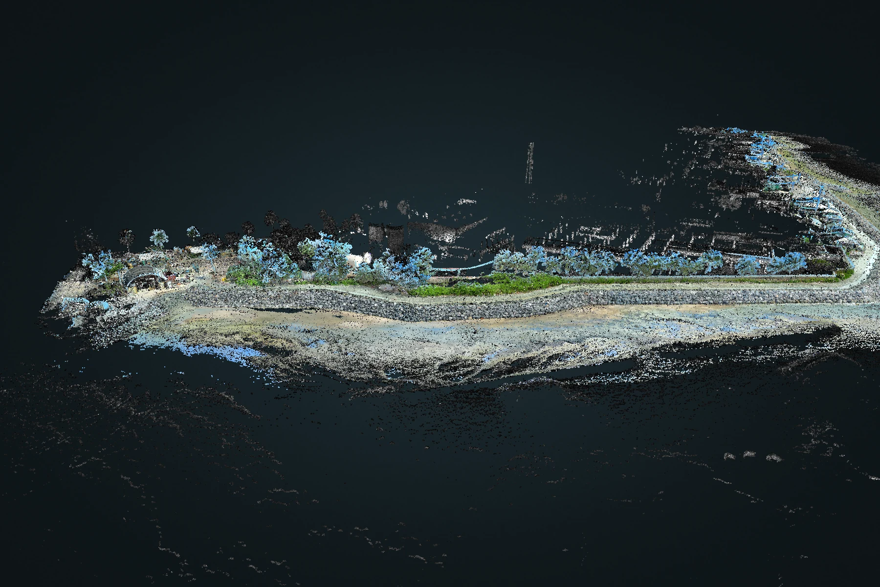 Oblique view of a denoised Atlas point cloud showing a road and surrounding site
