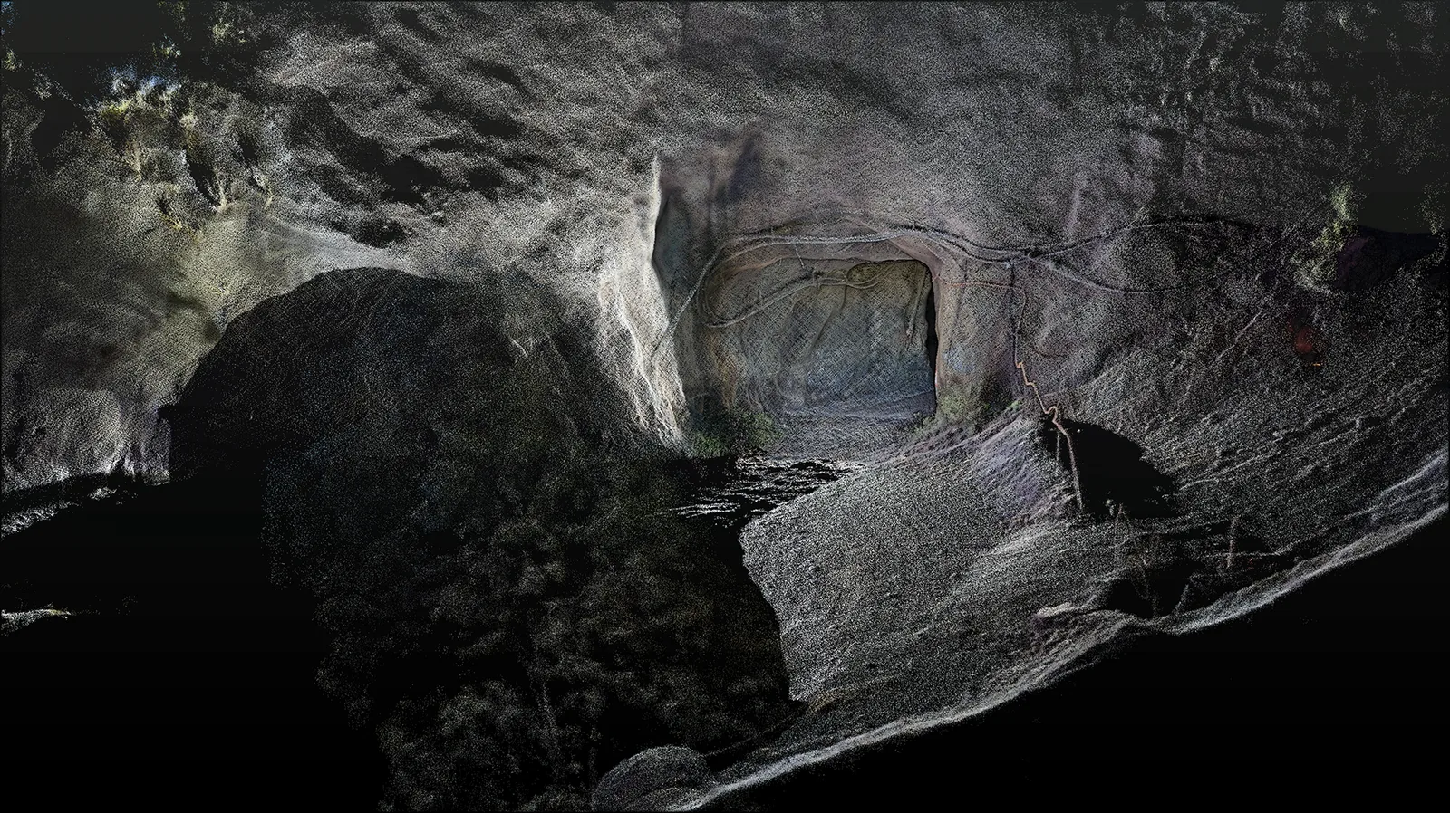 Point cloud of a bare, low-detail underground cavern and tunnel portal